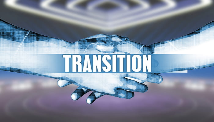 Transition Sign with Two Hands Shaking as a Background 