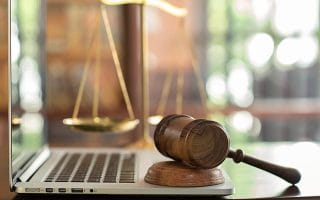 A Gavel on a Laptop