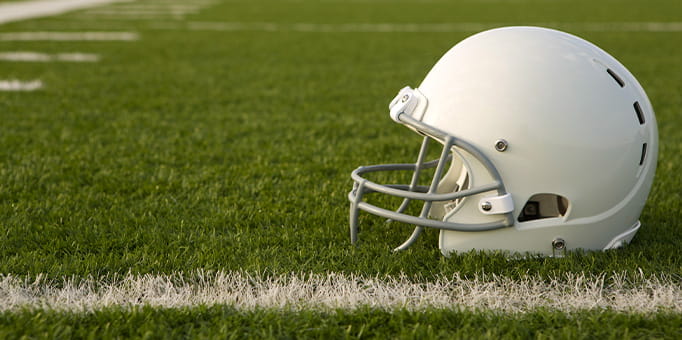 Image of helmet on a playing field